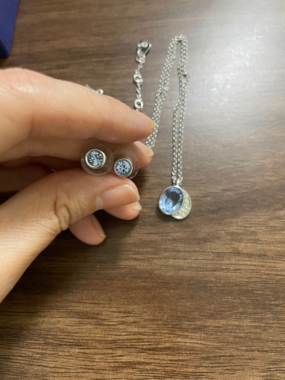 SWAROVSKI necklace and earring studs in silver with blue crystal
